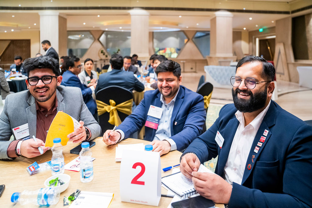 BNI Conclave — smiling members at table